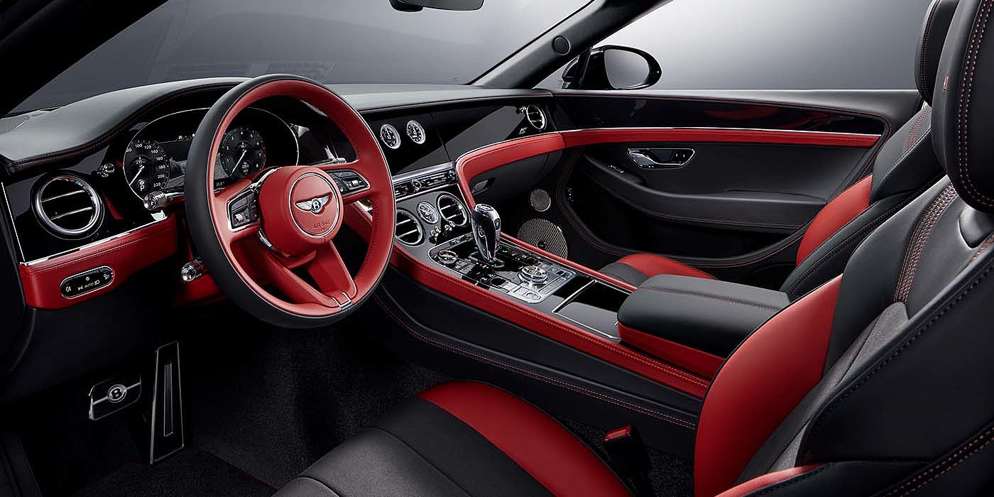 Bentley Geneve Bentley Continental GTC S convertible front interior in Beluga black and Hotspur red hide with high gloss carbon fibre veneer