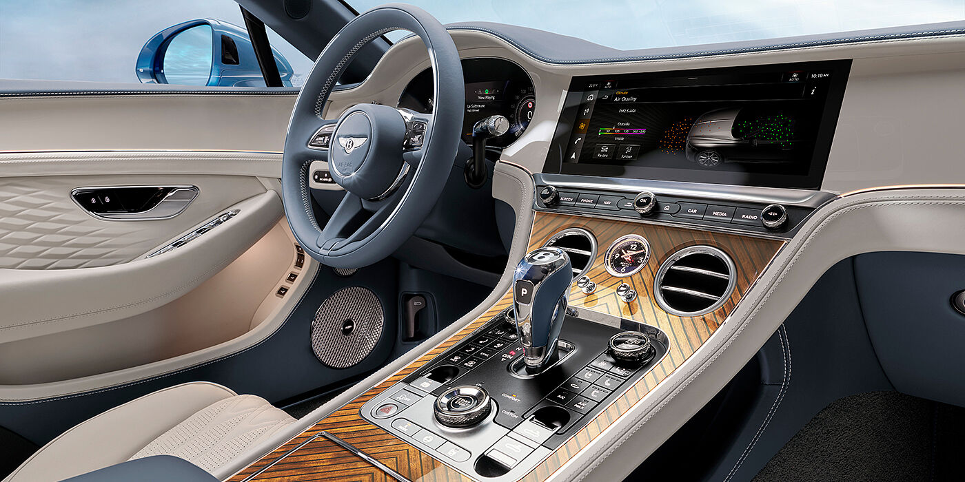Bentley Geneve New Bentley Continental GTC Azure convertible interior front cabin view with Linen and Brunel hides and Piano Linen by Mulliner veneer featuring centre console and centre MMI screen