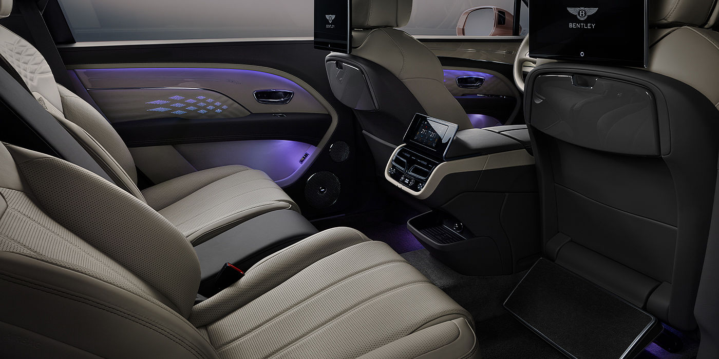 Bentley Geneve Bentley Bentayga EWB Azure SUV rear interior with Bentley Diamond Illumination