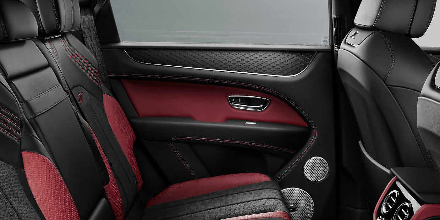 Bentley Geneve Bentley Bentayga S SUV rear interior in Beluga black and Hotspur red hide