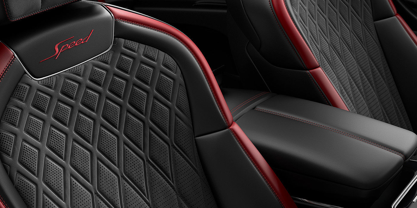 Bentley Geneve Bentley Flying Spur Speed sedan seat stitching detail in Beluga black and Cricket Ball red hide