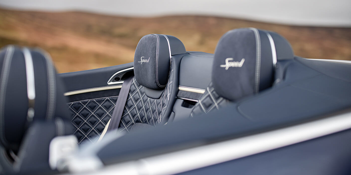 Bentley Geneve Bentley Continental GTC Speed convertible rear interior in Imperial Blue and Linen hide