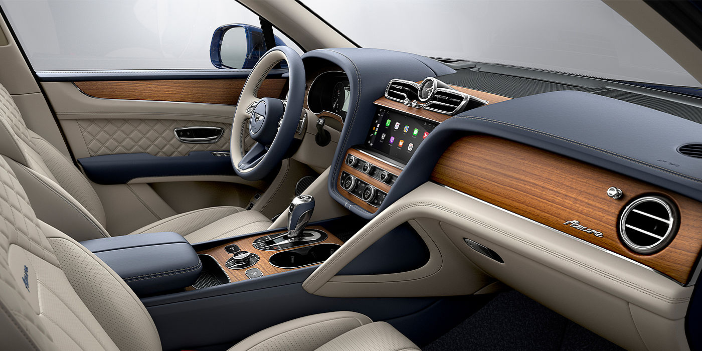 Bentley Geneve Bentley Bentayga Azure SUV front interior in Imperial Blue and Linen hide