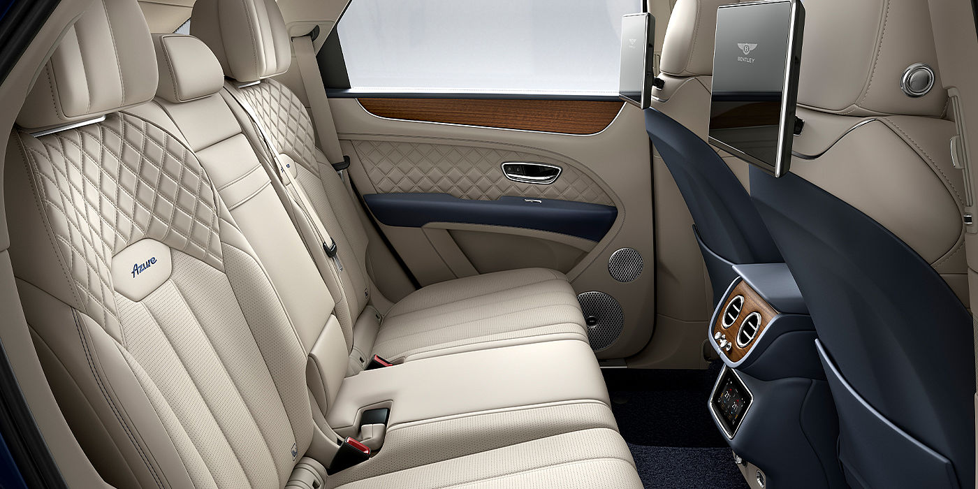 Bentley Geneve Bentley Bentayga Azure SUV rear interior in Imperial Blue and Linen hide